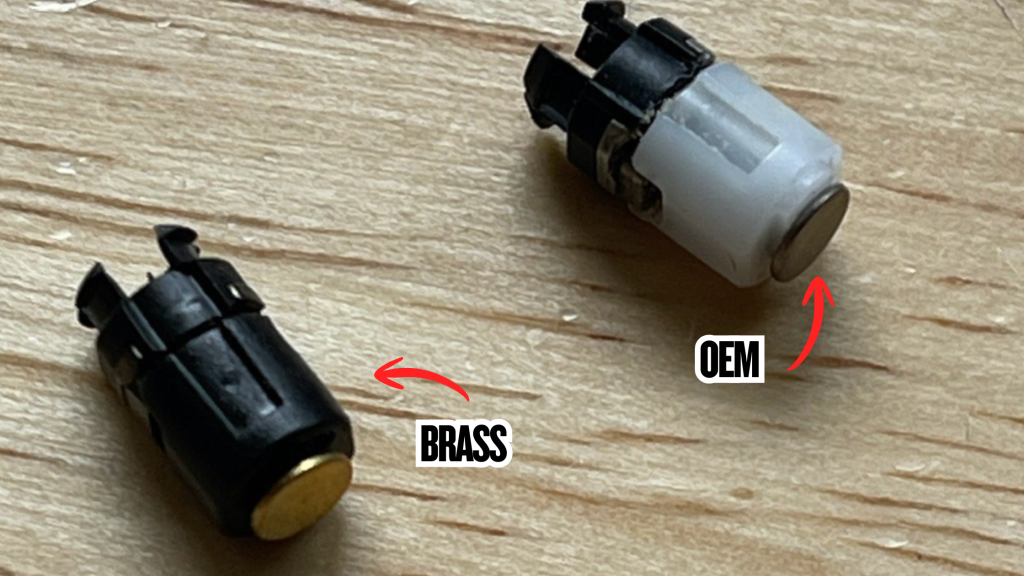 Side-by-side comparison of GBA SP brass hinges and OEM hinges showing the solid brass stalk versus worn original hinge construction