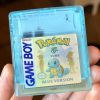 Close up of Pokemon YUME cartridge in clear blue with white PCB